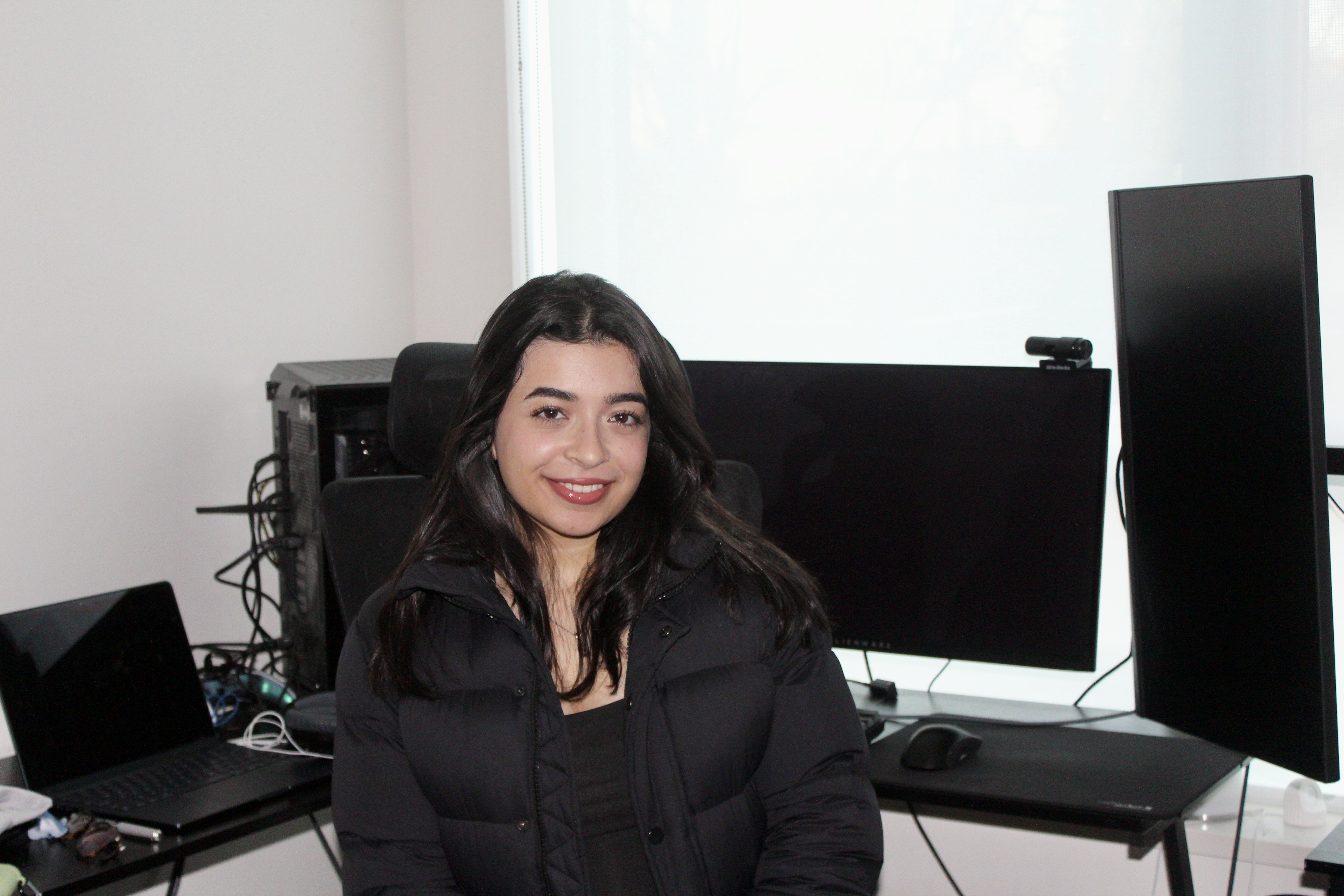 Riddhi at her workstation